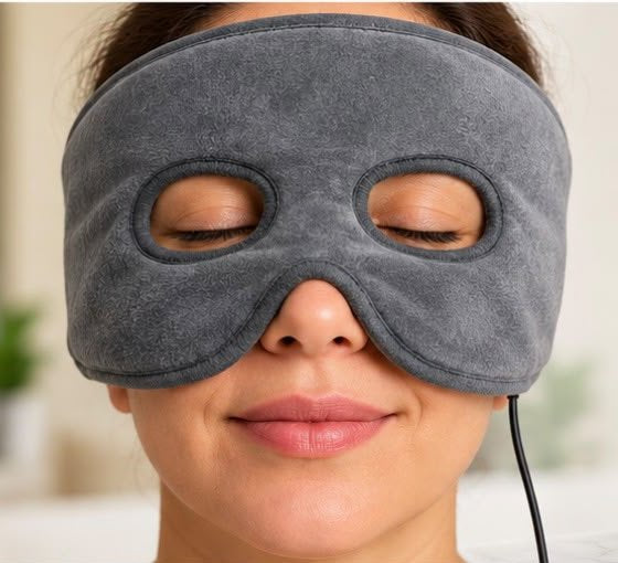 WarmVeil heated eye and sinus mask worn with eyes closed