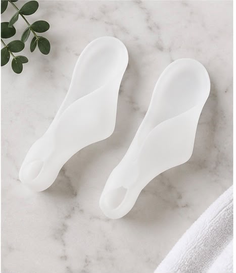 Ghinora gel toe spacers worn on the foot