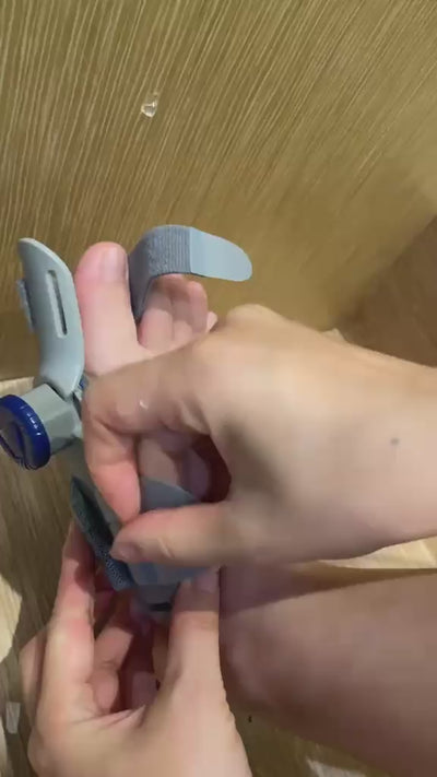 Close-up of the bunion corrector strap and adjustable knob
